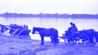 Fuhrwerk und Schiff an der Donau